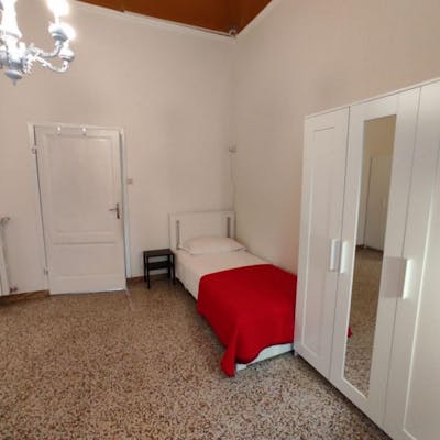 Single bed in twin bedroom in Porta al Prato