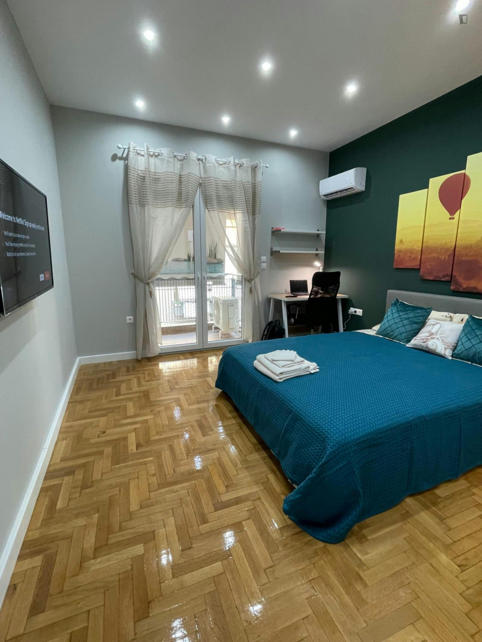 Colourful double ensuite bedroom in the Amerikis Square area