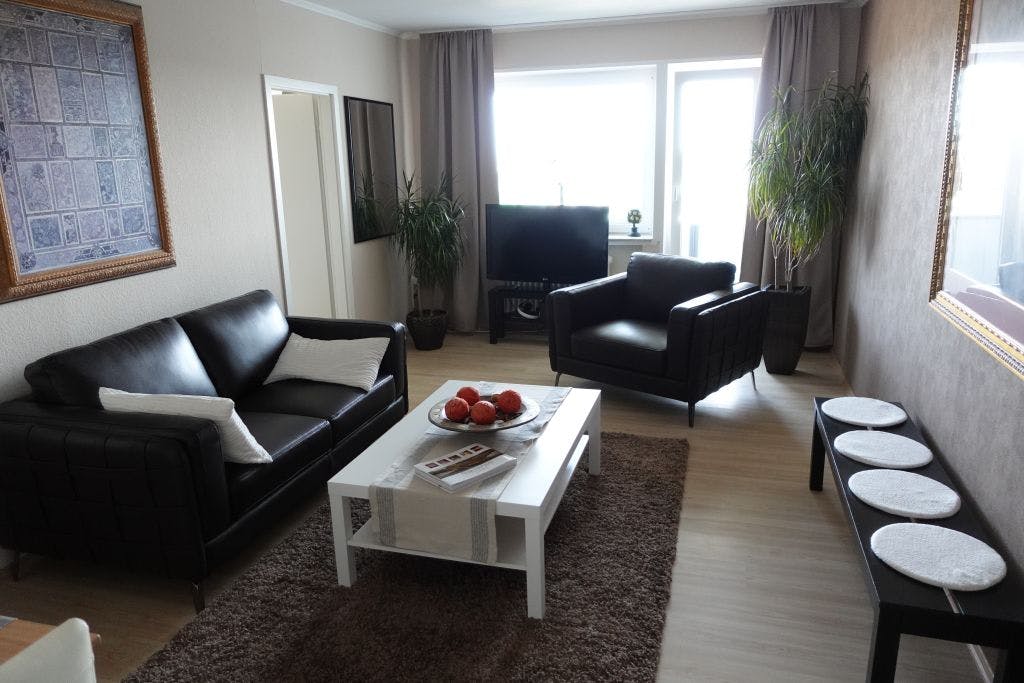 Stylish with skyline view - bright 2 rooms top furnished - garage/WLAN/NK incl.