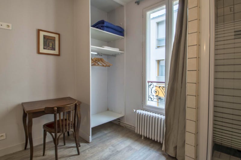 Bright single ensuite bedroom in a hotel, in the 18th arrondissement