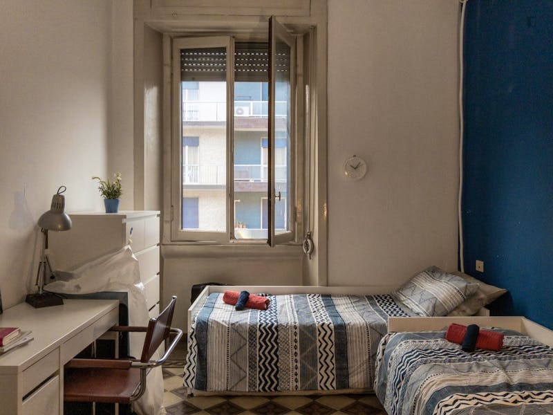 Bed in a twin bedroom in Porta Romana neighbourhood