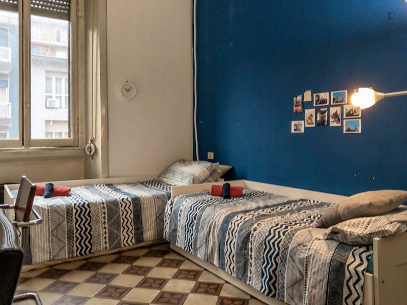 Bed in a twin bedroom in Porta Romana neighbourhood