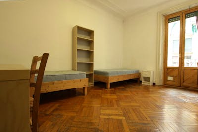 Bed in a twin bedroom close to the city center