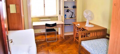Bed in a twin bedroom, in a 3-bedroom flat near the Forlanini train station
