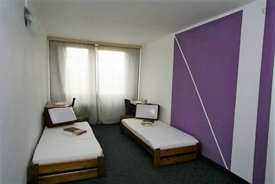 Bed in a twin bedroom, in a residence near Modřanská rokle