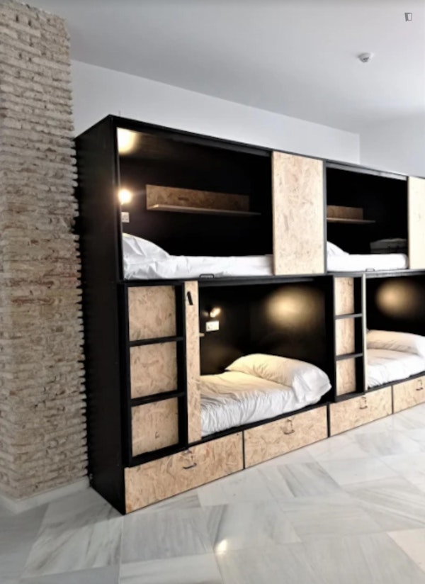 Bed in an ensuite 4-bed dorm, in a hostel near Playa La Caleta