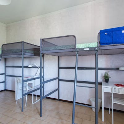 Single bed in a twin bedroom in Sesto San Giovanni Neughbourhood  - Gallery -  1