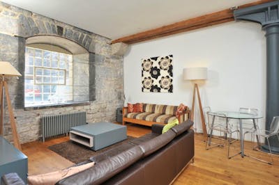 Contemporary two bed ground floor apartment in historic waterside setting